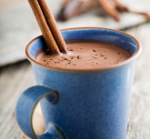 Hot chocolate with cinnamon stick as spoon