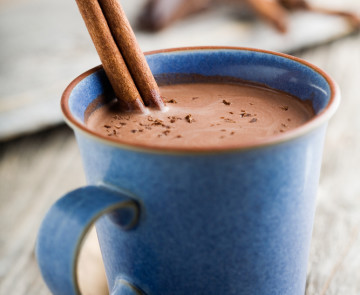 Hot chocolate with cinnamon stick as spoon